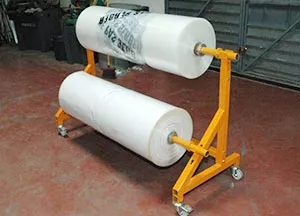 Zubehör: Folienabrollgerät für 2 Rollen, optional mit Rädern