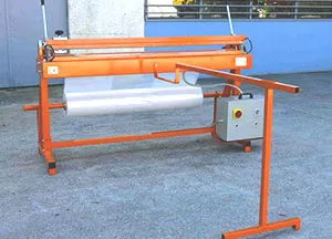 Haubengerät Ripack Multicover 949E mit elektrischer Schweißung, Querschneider und Rädern